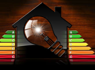 Een illustratie van een gloeilamp in een huis en de EPB-niveaus