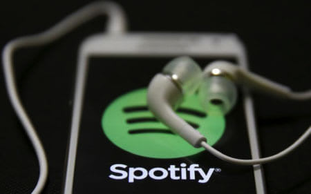 Spotify_online muziek_streaming_koptelefoon_nummer_1